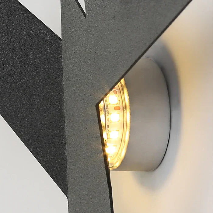 Kreativ - wandlampe aus eisen in form eines vogels