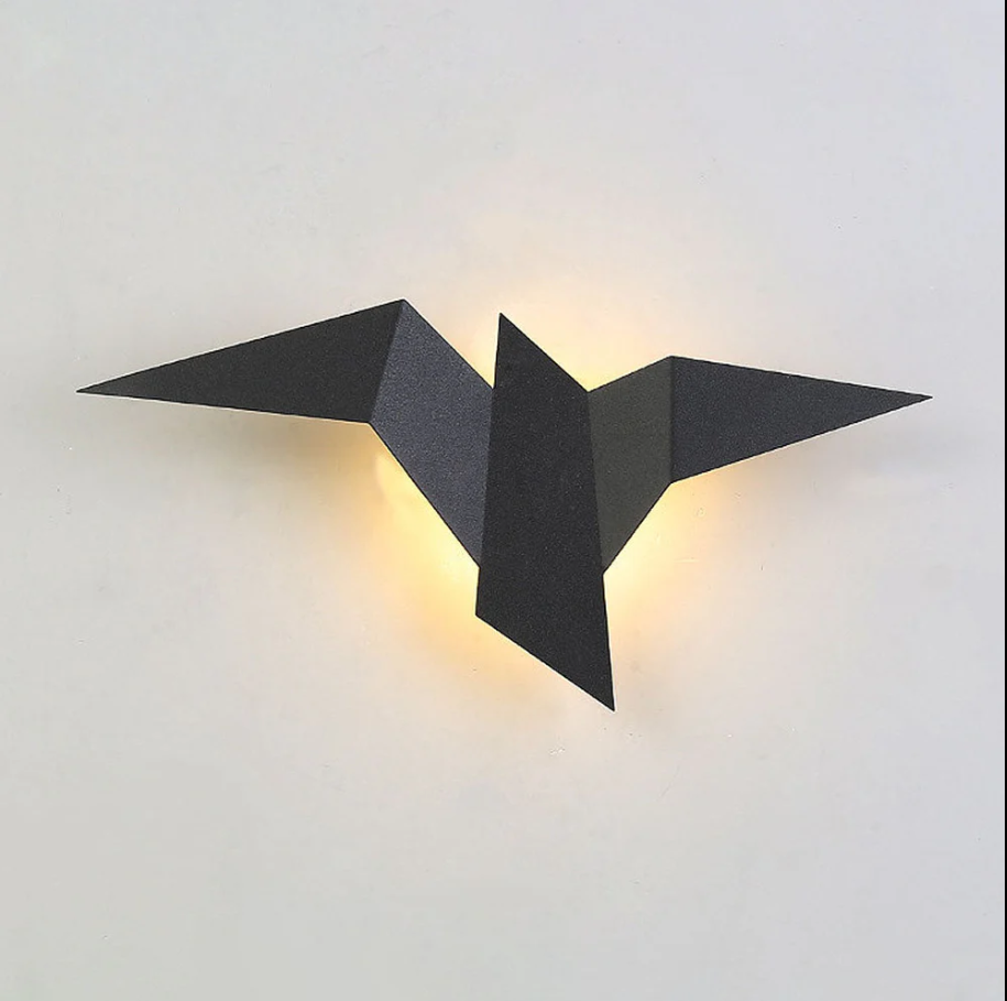 Kreative wandleuchte aus eisen in vogelform