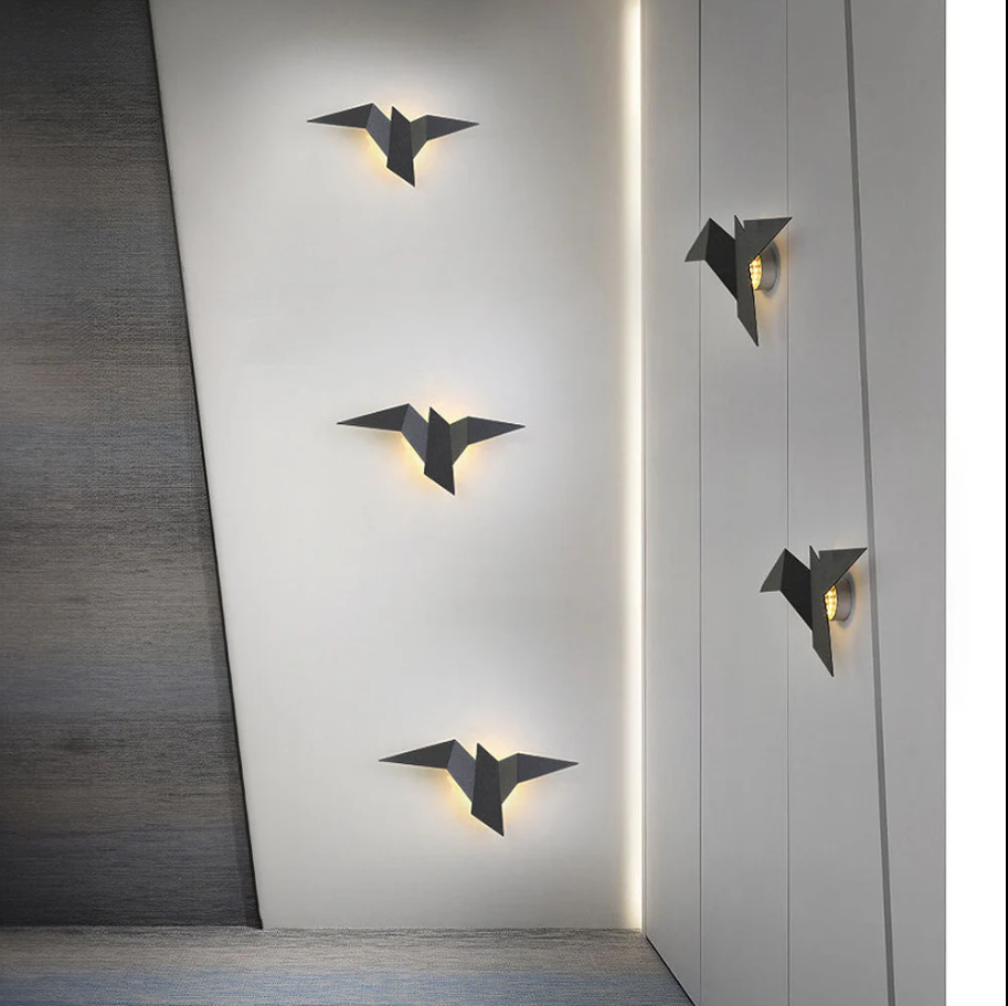 Kreative wandleuchte aus eisen in vogelform