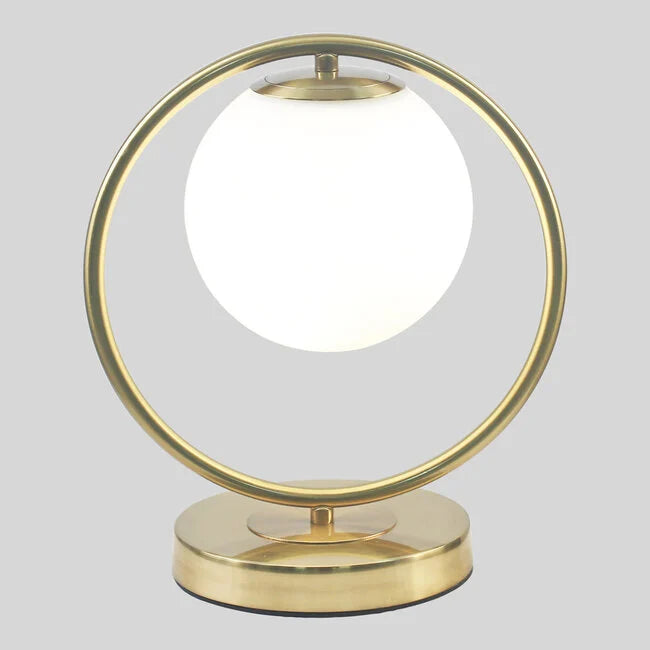 Goldene design-tischleuchte mit milchglas - gene